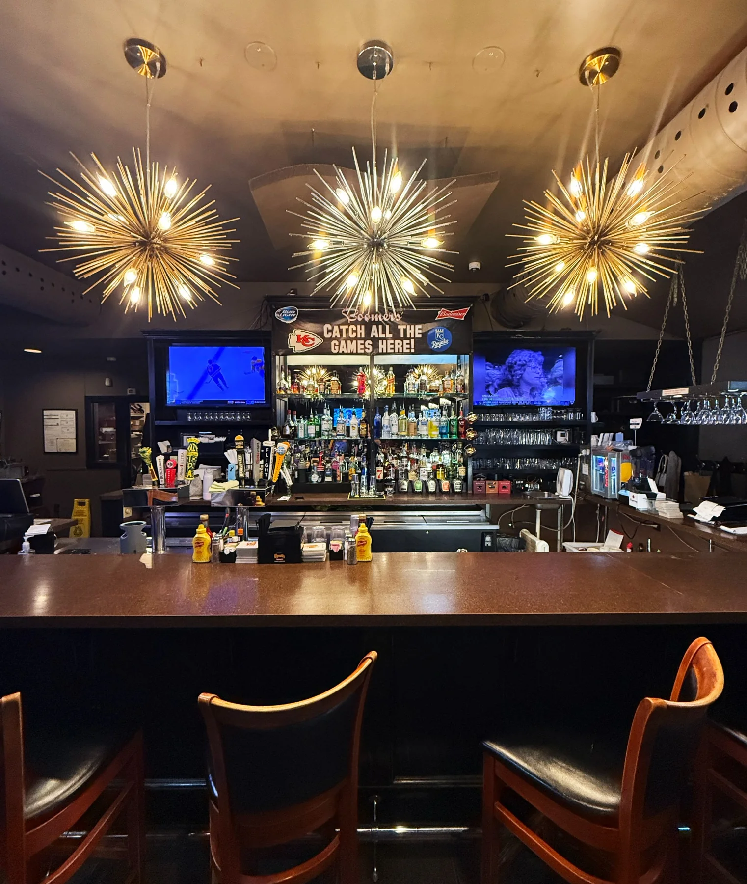 The bar at Boomers’ under warm starburst lights